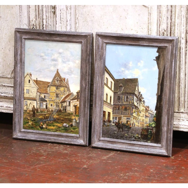 Capture the architectural beauty and everyday life of Normandy with this complementary pair of antique genre paintings...