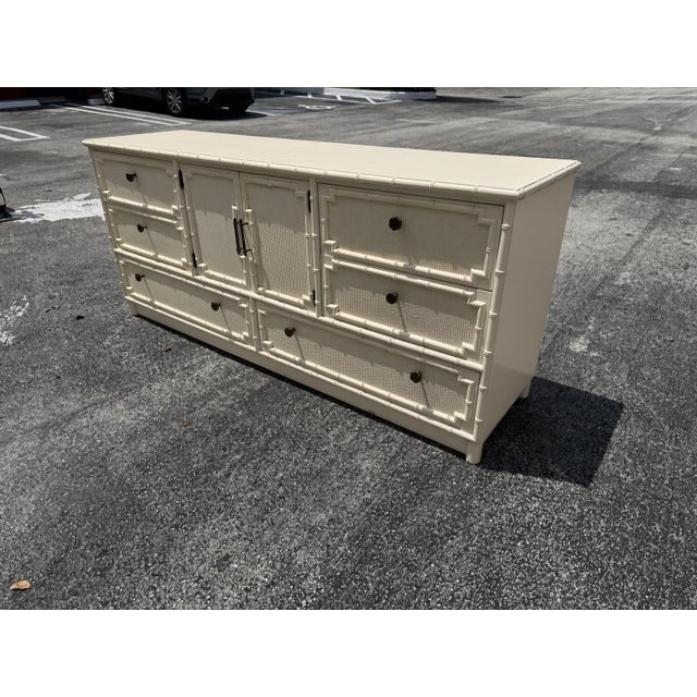 Vintage Drexel Kensington Faux Bamboo dresser in a Hollywood Regency Coastal Palm Beach style. It features the original...