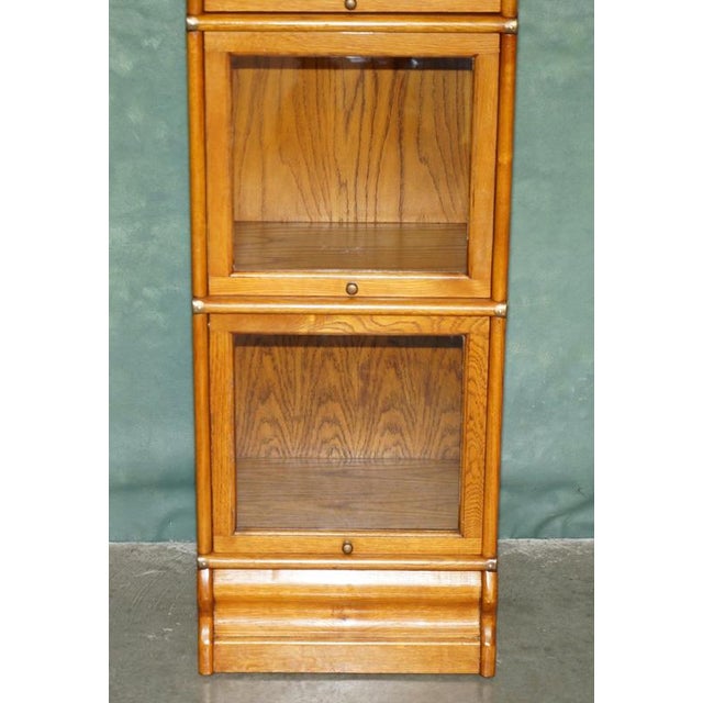 2000 - 2009 Antique Modular Honey Oak and Gilt Brass Stacking Bookcase with Glazed Retracting Doors For Sale - Image 5 of 18