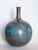 Spherical stoneware vase created by the artist Carlo Zauli in the 1970s. Sculpture, blue colour. Signed under the base as...