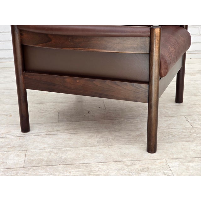 1970s, Scandinavian armchair. Original brown furniture leather with patina, dark beech wood. Original good condition: no...