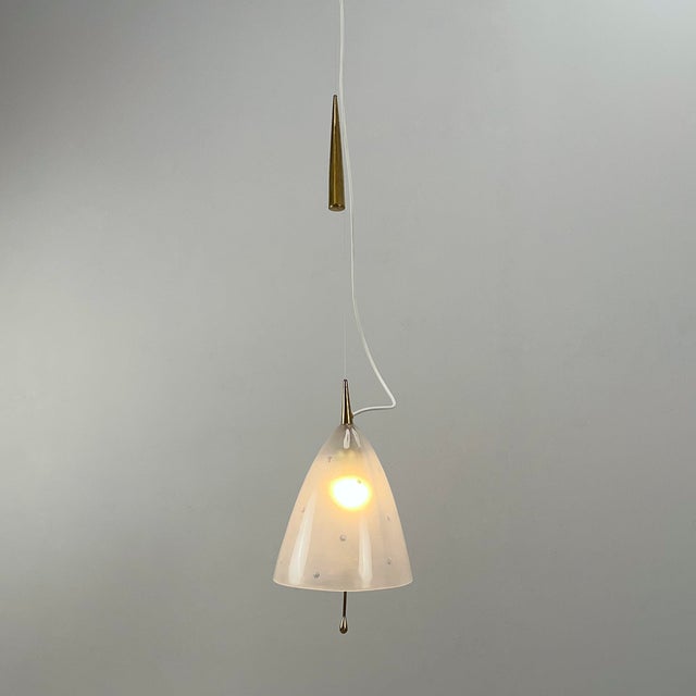 Cable length: 160cm, can be easily shortened. This piece is designed in the style of the selected designer and/or...