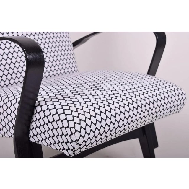 According to the original process, our professional refurbishing team in Czechia has restored and reupholstered the item....