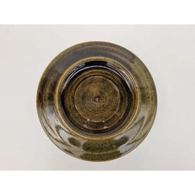 Horst Nagel's large studio ceramic, moss -green glazed and scribbled. Very nice and decorative shape. This piece has an...