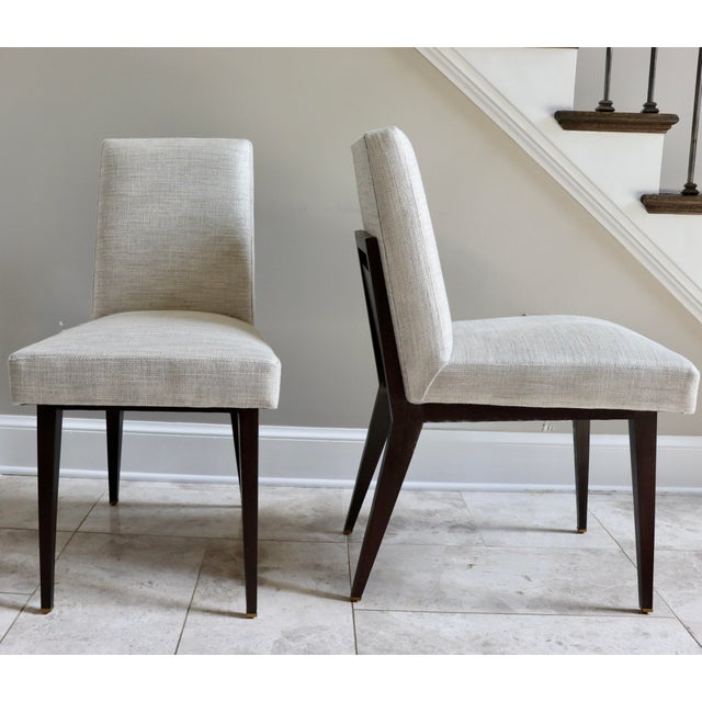 Wedge Dining Chairs by Thomas Pheasant for Baker Furniture. The geometric design seamlessly meshes with the tailored seat....