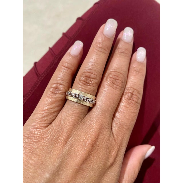 Cute and dainty 0.07 Carat Diamond band that is sure to be a great addition to anyone's accessory collection! The band is...