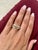 Cute and dainty 0.07 Carat Diamond band that is sure to be a great addition to anyone's accessory collection! The band is...
