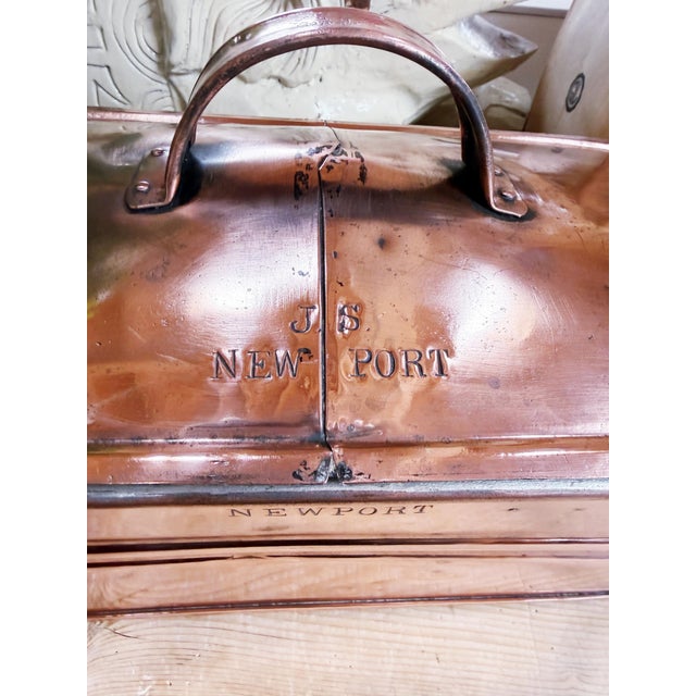 A wonderful antique circa 1890s copper fish boiler/poacher with rolled rim, iron handles, and tinned insert & lining. Made...