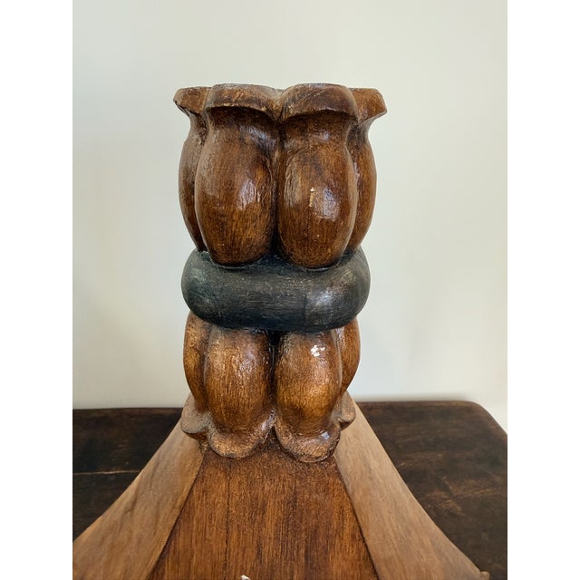 A pair of antique 19th-century wooden wall brackets.