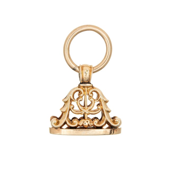 Lovely antique Victorian fob (circa 1880s to 1900s) crafted in 14 karat yellow gold. The beautifully detailed antique fob...