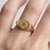 Channel a celestial, vintage charm with a modern twist. This striking signet ring features an oval face detailed with a...
