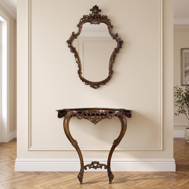 Prestigious and elegant furniture set comprising a wall-mounted console table with a marble top and a matching mirror in...