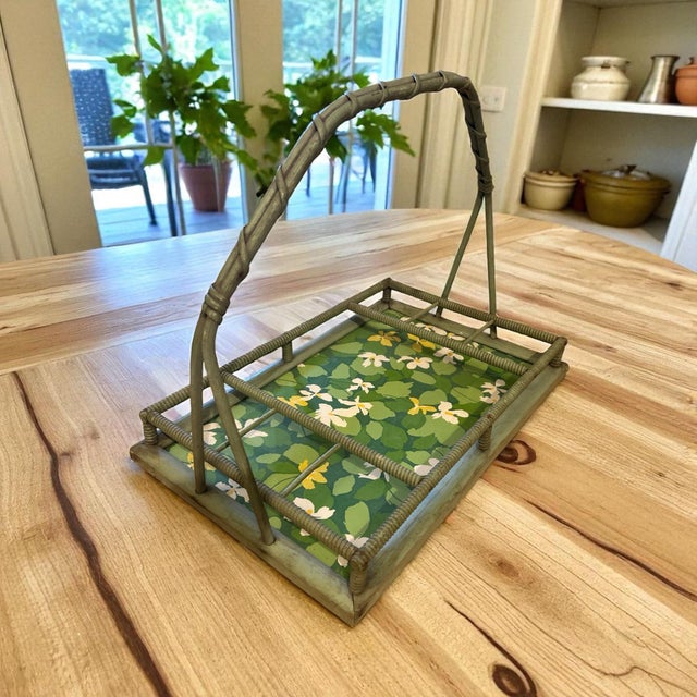 This piece is not only charming but useful as well. Its frame is constructed with green painted rattan. With a high arched...