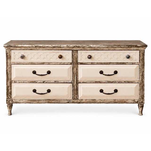 A six-drawer El Chico dresser by Kent Coffey, identified by the interior maker mark shown in the photographs. Decorative...