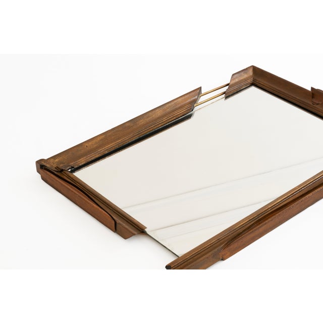 This incredible asymmetrical mirror in hand-carved wood signed by « Bizouati » and dated 1992 is a unique and artistic...