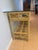 The console table was purchased in 1986. Ficks Reed distressed pineapple bamboo tempered glass top table comes from a set...