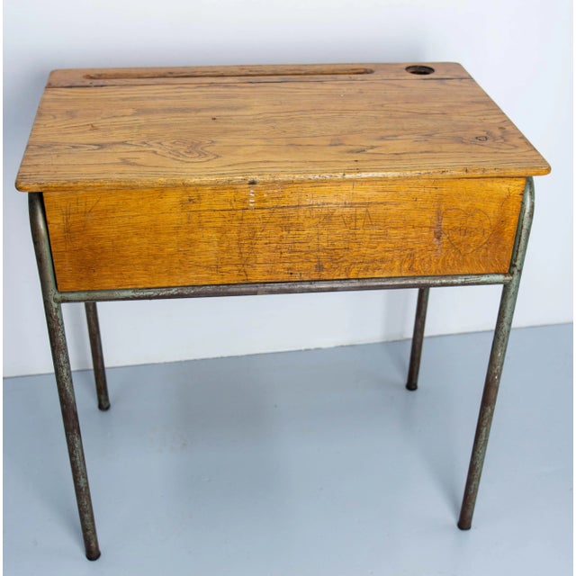 French slant top desk writing table for student, circa 1950. Oak and iron pupitre Good vintage condition with nice patina....