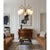 A refined and sculptural five-arm Stilnovo chandelier crafted in warm-toned brass, featuring gracefully curved arms that...