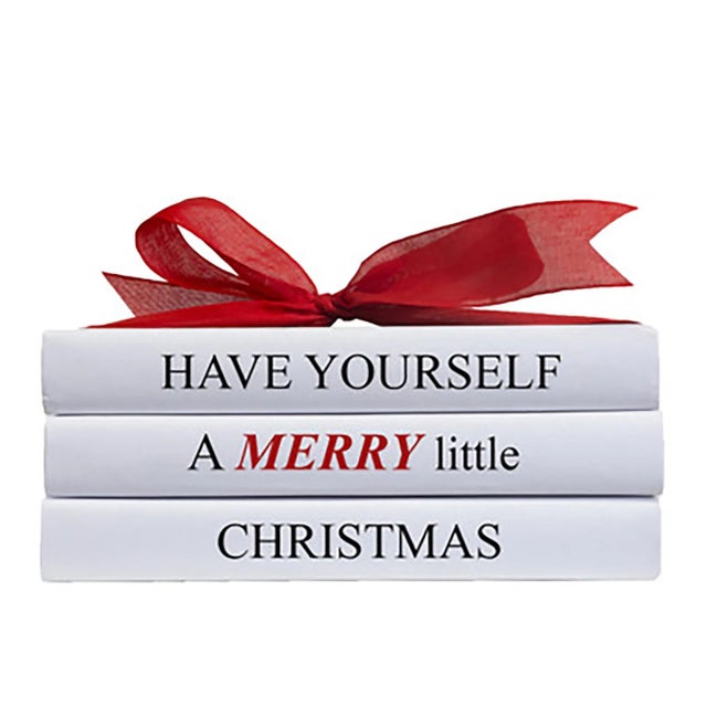 Celebrate the season with our "A Merry Little" Holiday book set. Three books with custom spines, with a coordinating red...