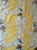 Vintage Rose Cumming “Lace” chintz fabric in a rich yellow ground with trompe-l’oeil lace swags and floral bouquets. A...