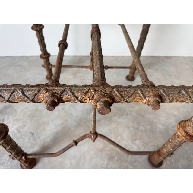 A striking vintage Brutalist end or accent table base in the style of Israeli artist Ilana Goor, featuring a sculptural...