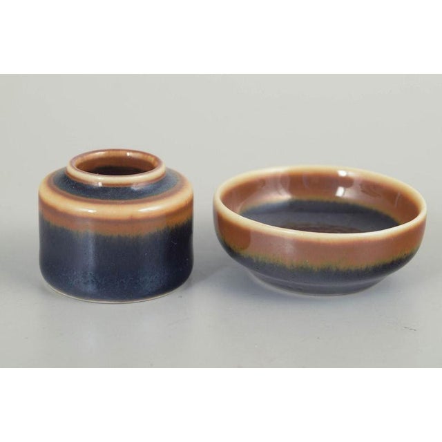 Carl-Harry Stålhane for Rörstrand. Miniature Vase and bowl, mid 20th century. Two small stoneware pieces in the classic...