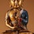 This captivating vintage sculpture depicts Shakyamuni Buddha seated in deep meditation upon a prominent, highly detailed...