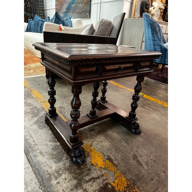 A beautifully carved Italian Renaissance Revival side table, this 19th-century piece is a sophisticated blend of...