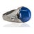 Platinum ring with approximate 15.00 carat star sapphire and 4 square cut diamonds weighing approximately 0.48 carats....