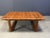Mid century solid teak coffee table attributed to Niels Bach. Beautiful rectangular table top with an interlocking base....