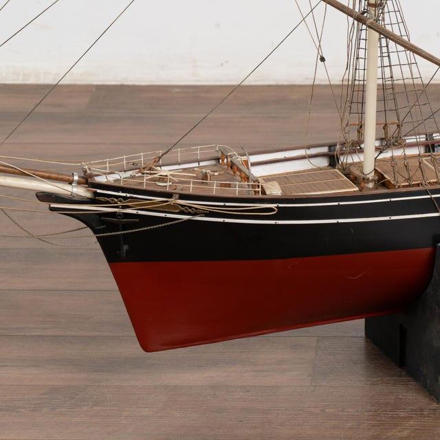 The craftsmanship and attention to detail in this Danish three-masted sailboat is impressive. Rests firmly in black stand....