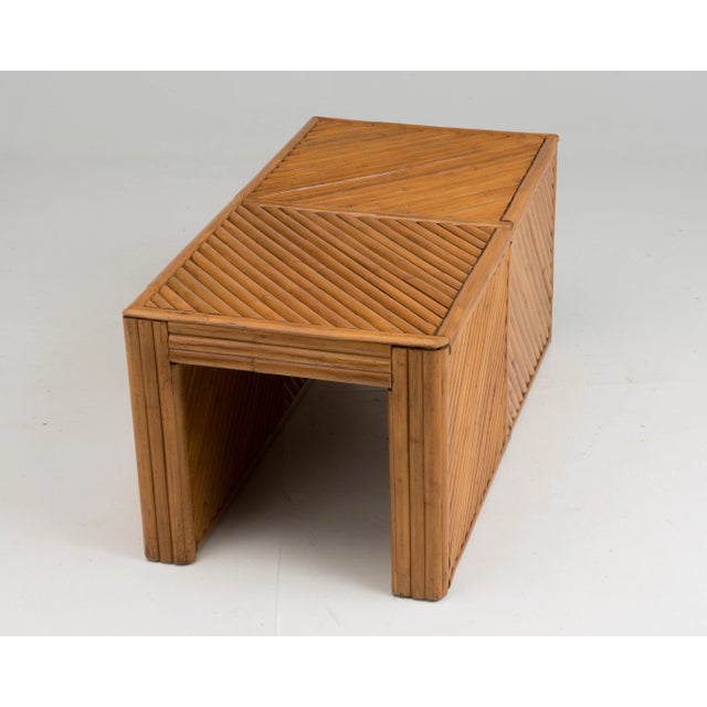 Vintage split reed rattan bench. A solid, sturdy piece with the classic, natural warmth of rattan