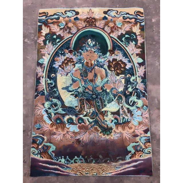 "W-60cm,H-90cm This Xizang Embroidery and Brocade Thangka Buddha Painting is a handmade spiritual home decor piece...