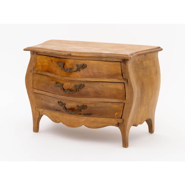 Italian Walnut Miniature Chest of Drawers, with serpentine top above bombe form chest with brass hardware, stamped "Made...