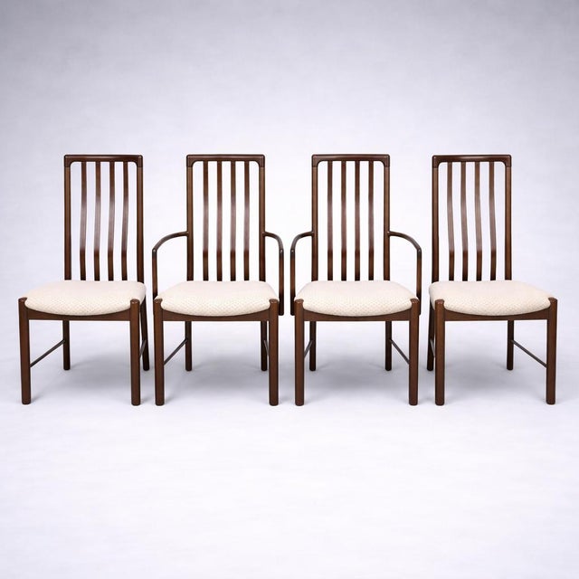 A striking set of six Danish rosewood dining chairs by Boltinge, showcasing the refined craftsmanship and sculptural...