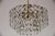 This beautiful crystal chandelier was produced in Vienna in the 1960s. The chandelier has 7 bulbs (one hanging down in the...