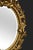 Brown Carved Gilt-Wood Oval Wall Mirror For Sale - Image 8 of 10