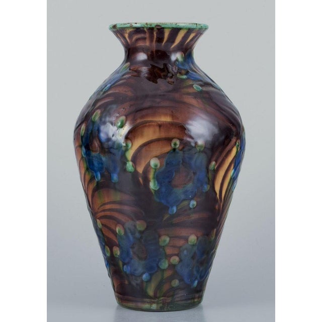 Kähler, ceramic vase. Cow horn technique. Glaze in shades of blue and brown. Ca. 1930s Marked. In excellent condition....