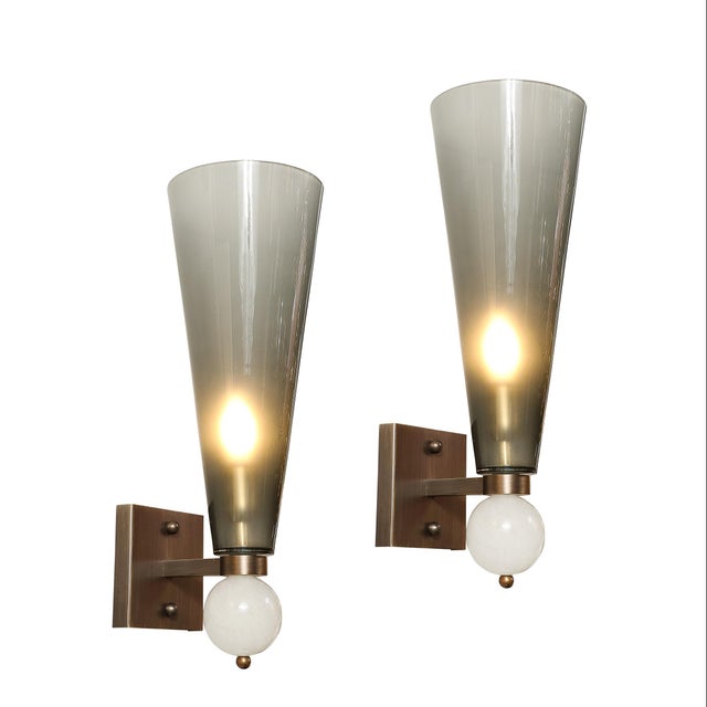 This exquisite pair of modernist Murano glass sconces epitomizes contemporary elegance and expert craftsmanship. Hand-...