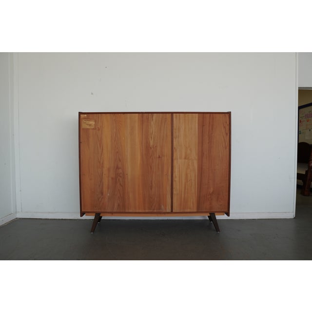 A beautifully preserved example of German Mid-Century Modern design, this 1950s–1960s highboard showcases a striking...