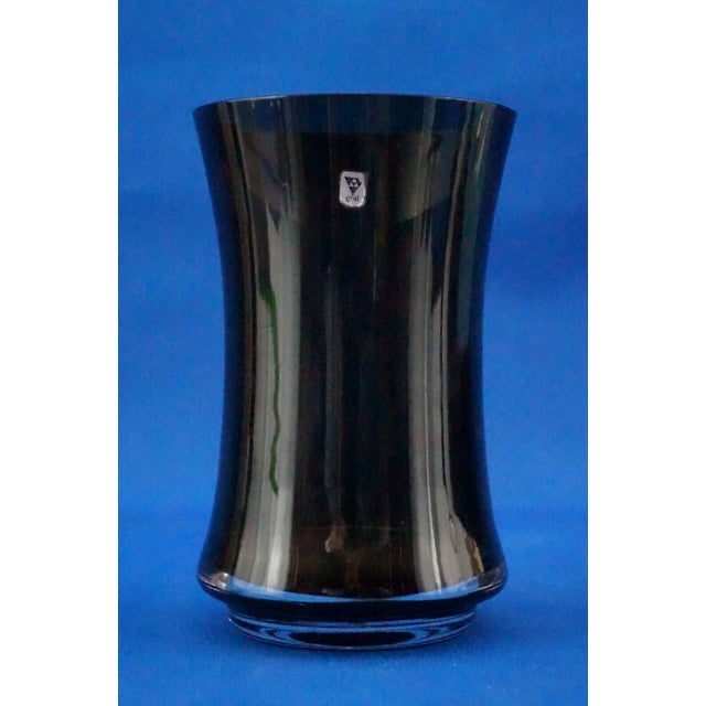 Item : Minimalist vase in dark smoked glass, made by the German manufacturer Gral Crystal, signed with a stamp under the...
