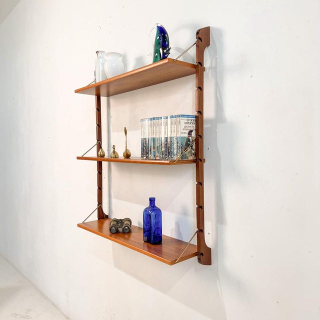 This Scandinavian mid-century shelving unit model Ergo was made in Norway in the 1960s. and was designed by John Texmon....