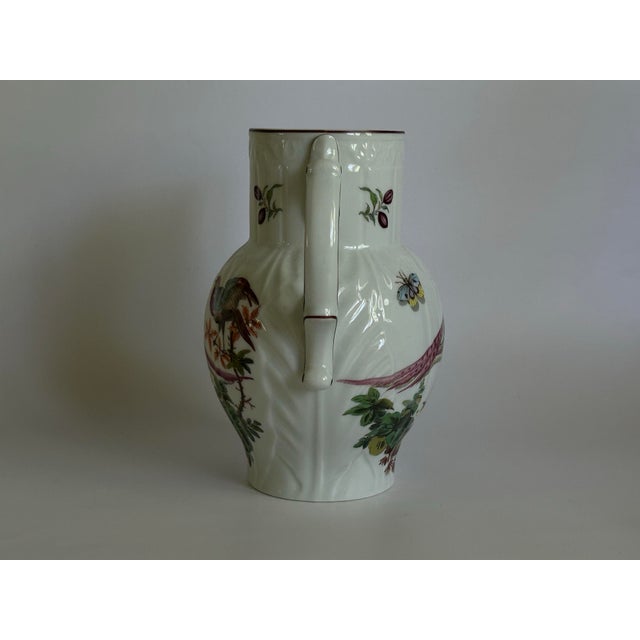 Inspired by 18th-century Chelsea porcelain, this Mottahedeh Williamsburg pitcher is finely crafted by Vista Alegre of...
