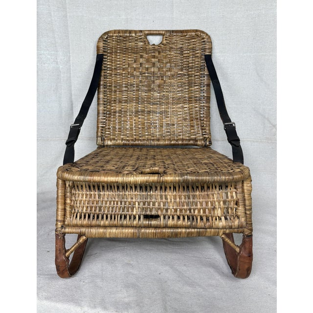 A beautifully crafted woven rattan field chair, designed for portability and comfort. The seat and back are hand woven in...
