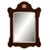 The King Edward carries the pierced scroll-top silhouette of an eighteenth-century English wall mirror, executed in a...