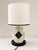 The lamp that everyone asks about! The classical sculptural form of a woman rests atop a round black marble base. When...