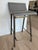 A sophisticated set of three “Gachot” counter stools by Thomas Hayes, featuring sleek architectural lines, supple...