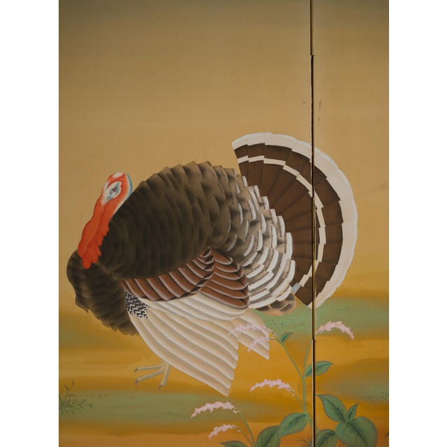 This elegant Japanese two-panel screen depicts a tom turkey displaying his magnificent plumage before a watchful hen,...