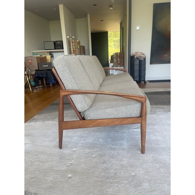 Rare Kai Kristiansen 4 Seater "Paper Knife" Teak Sofa. This sofa is offered a reduced price as there is a repair with...