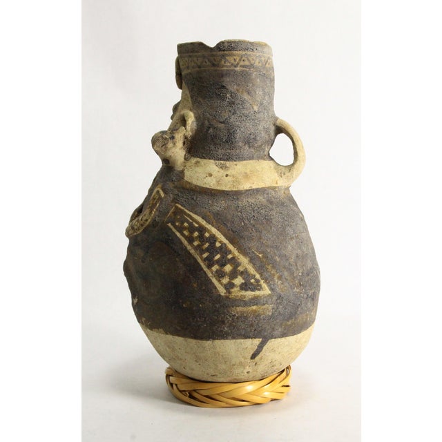 Tribal Peruvian Bichrome Figural Effigy Jar of a Hunter With Trophy For Sale - Image 3 of 16